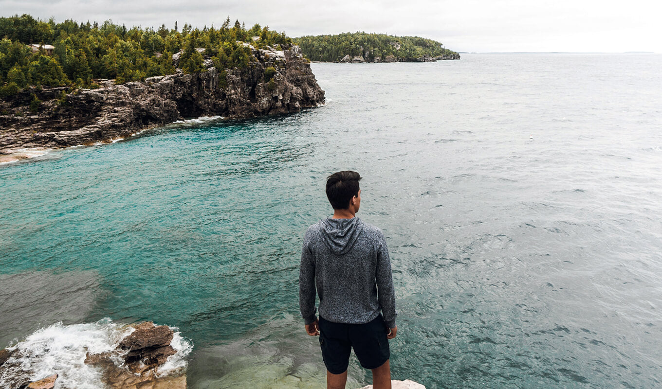 Man standing on the white rock at Bruce Peninsula National Park