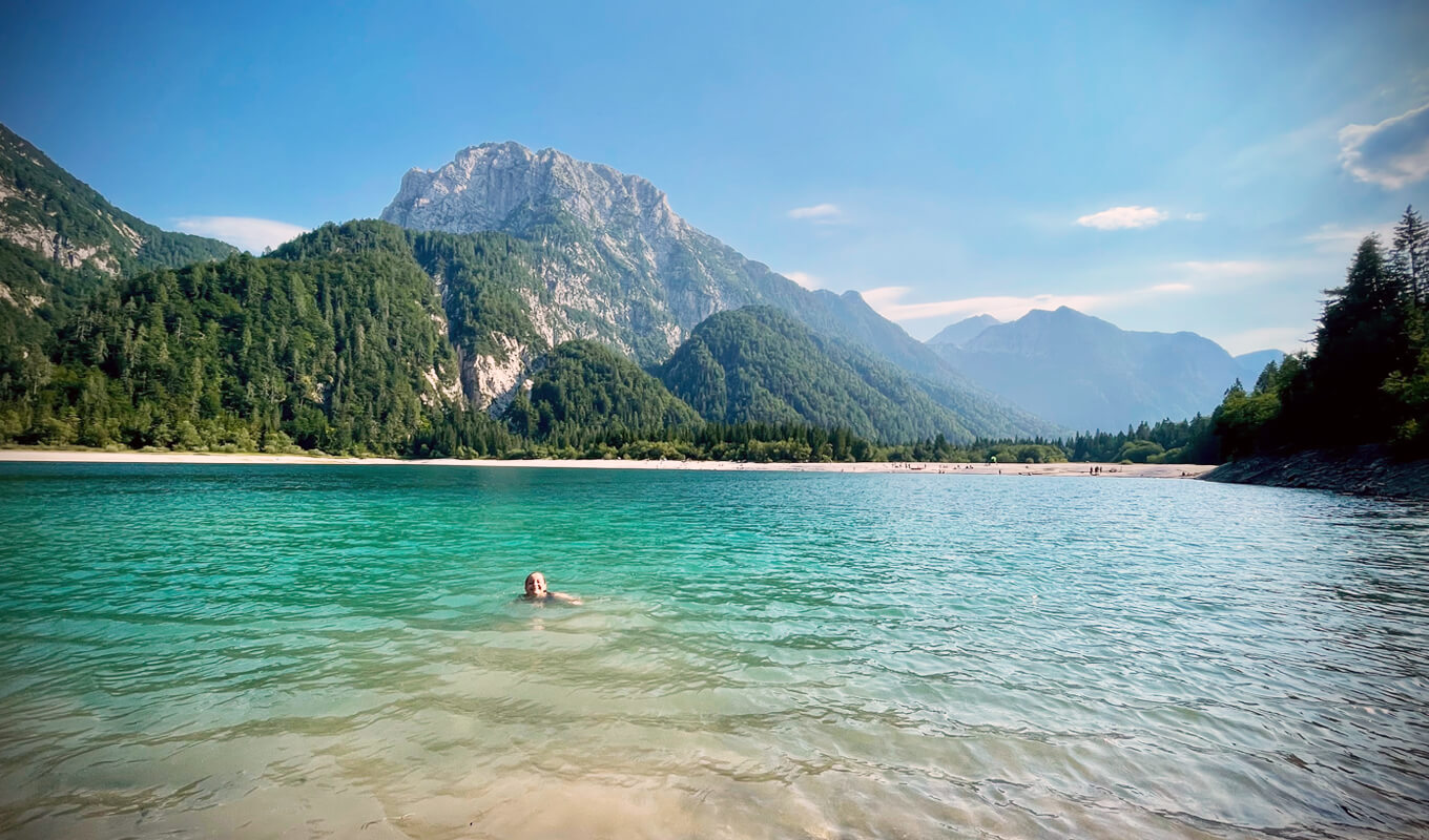 Woman swimming on Lake del predil