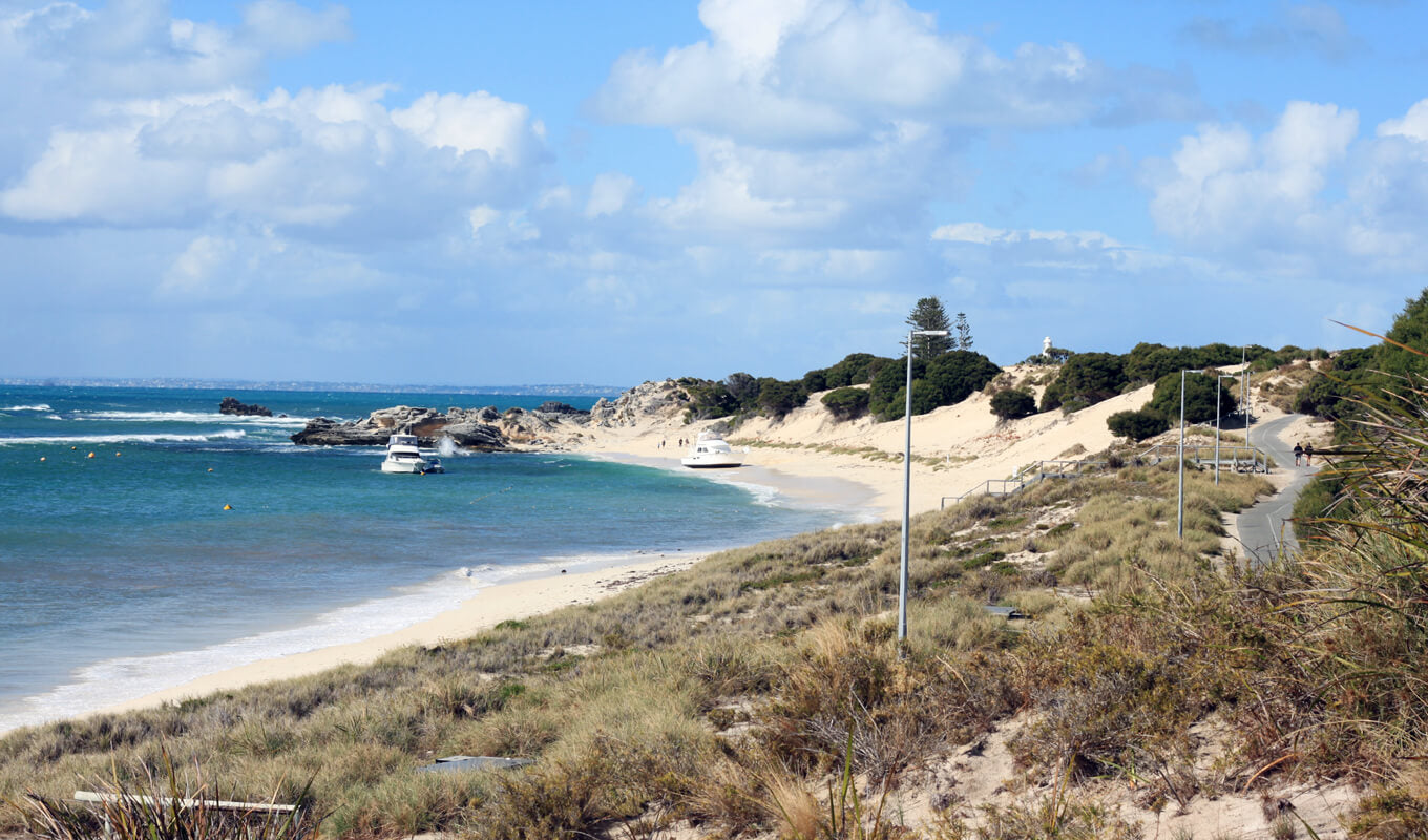 Yacht park on a clear blue sea of Rottness Island, Western Australia