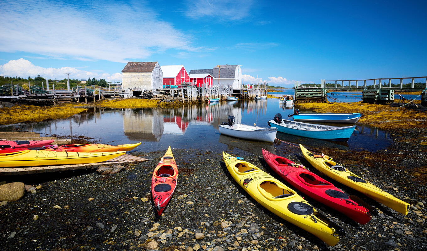 Yellow and red kayaks at Blue Rocks, Nova Scotia