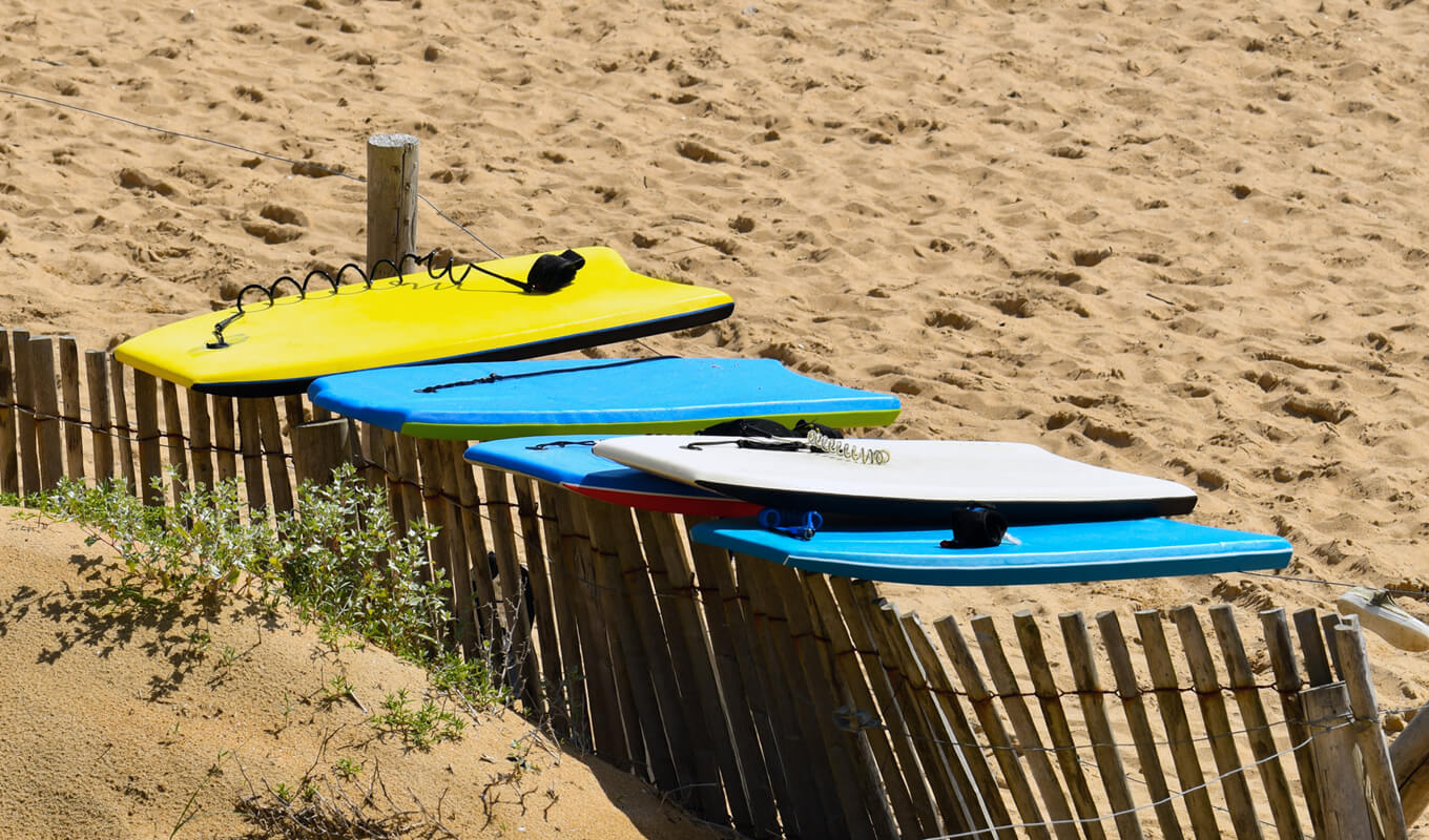 Boogie boards drying on the beach