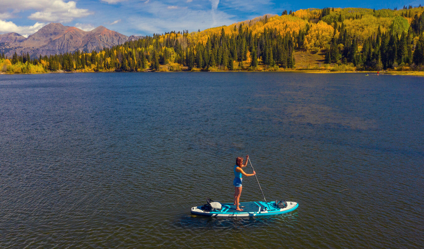 Woman GILI paddle boarding in Lost Lake