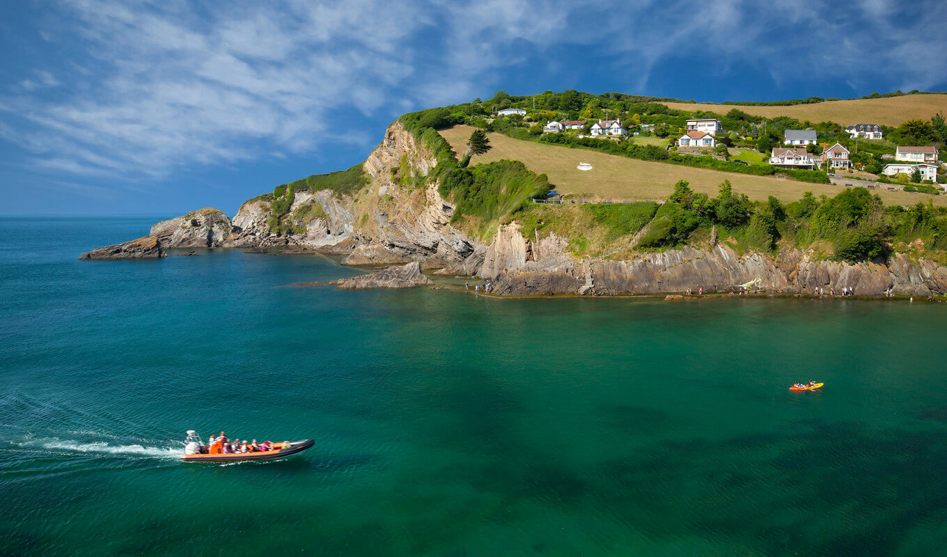 Kayak and boat near Combe martin north Devon