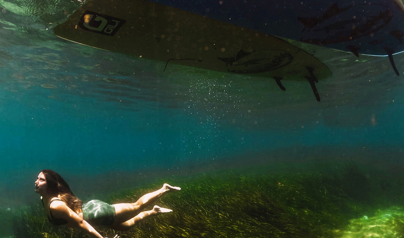 Woman diving underwater