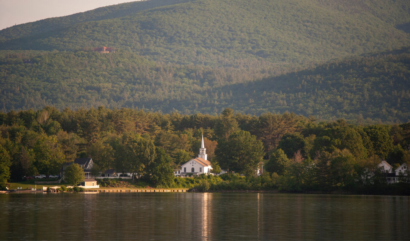 Church beside lake winnipesaukee