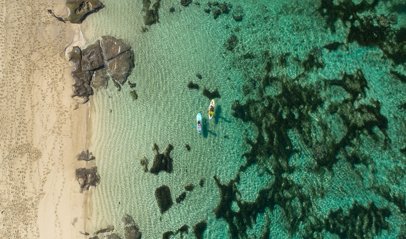 ocean paddle boarding melasti beach bali