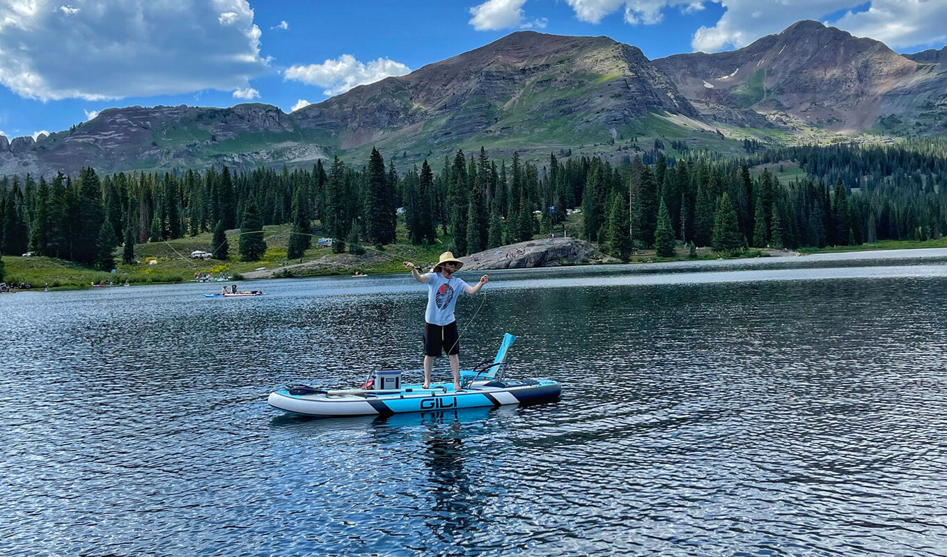 Man SUP fishing on a lake using a GILI Manta