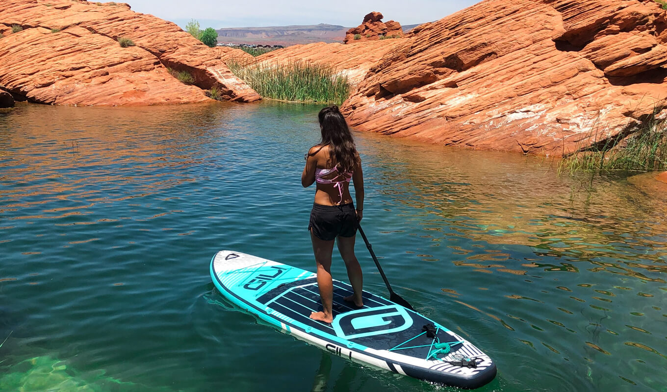 Woman paddle board in Sand Hollow State Park