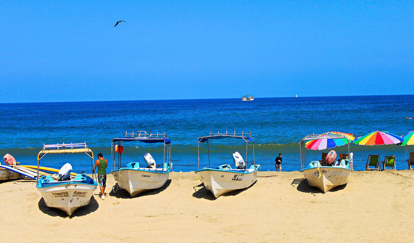 Boats on sandy beach of Sayulita, Mexico