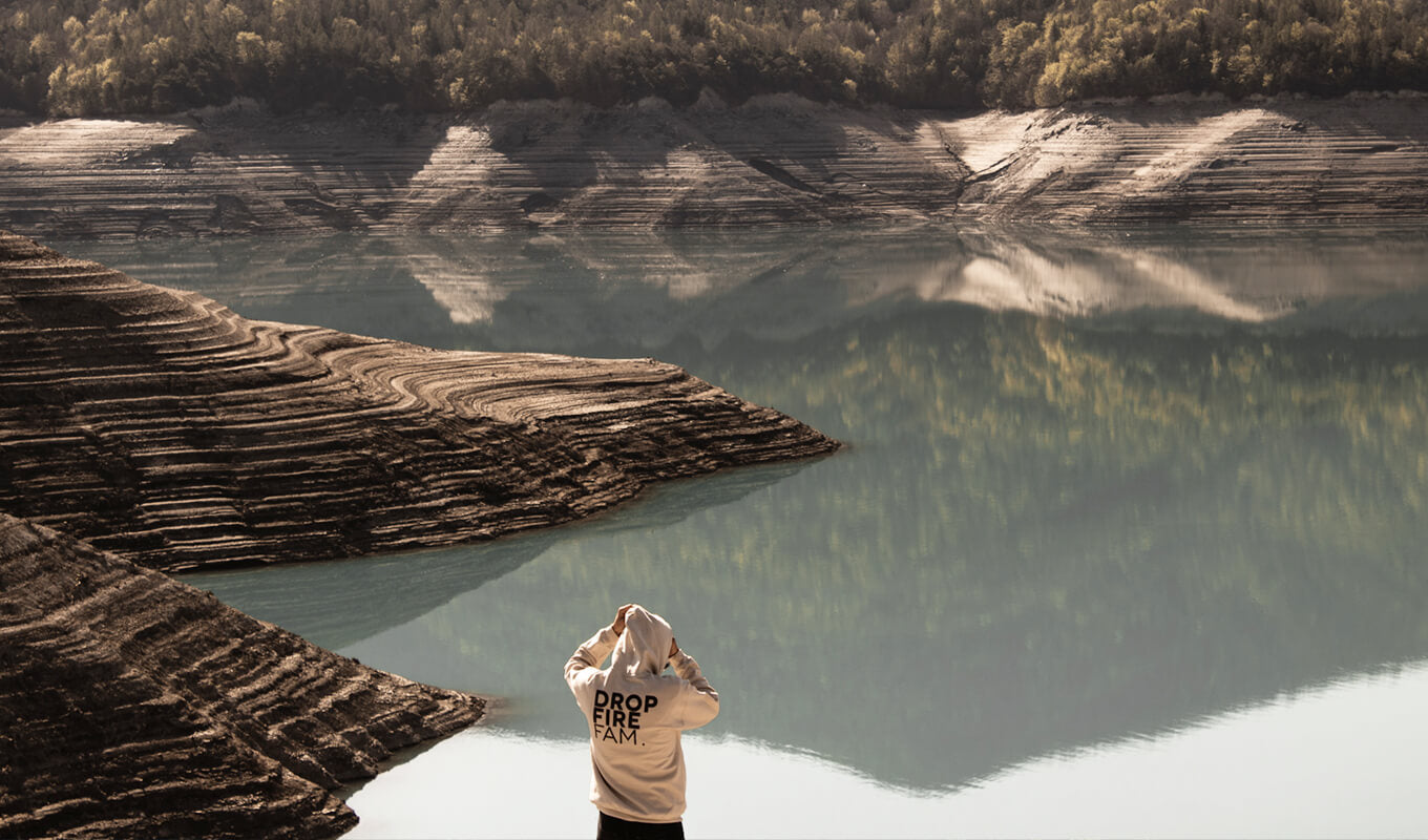Woman standing near Serre Poncon Lake