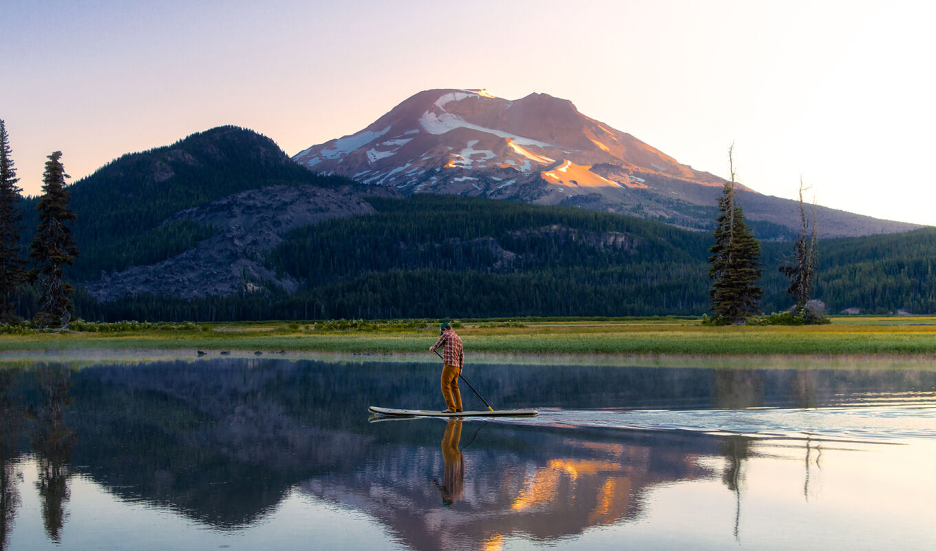 Man paddle boarding in Sparks Lake