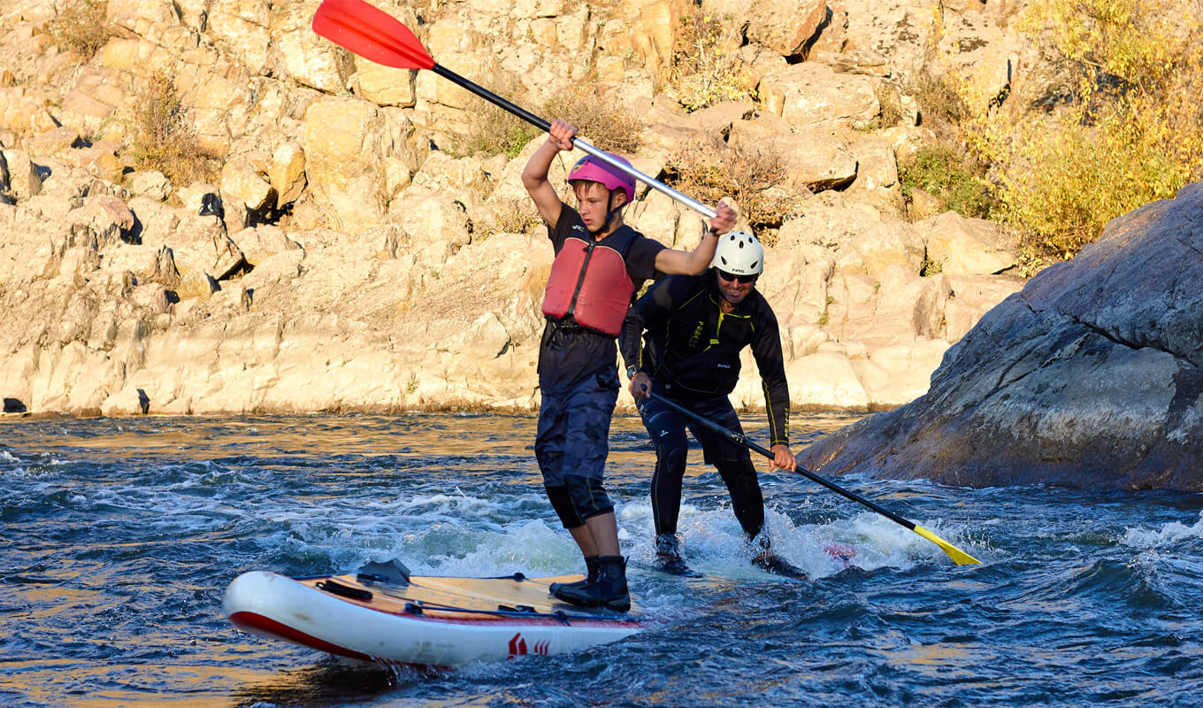 Whitewater activities using inflatable paddle board