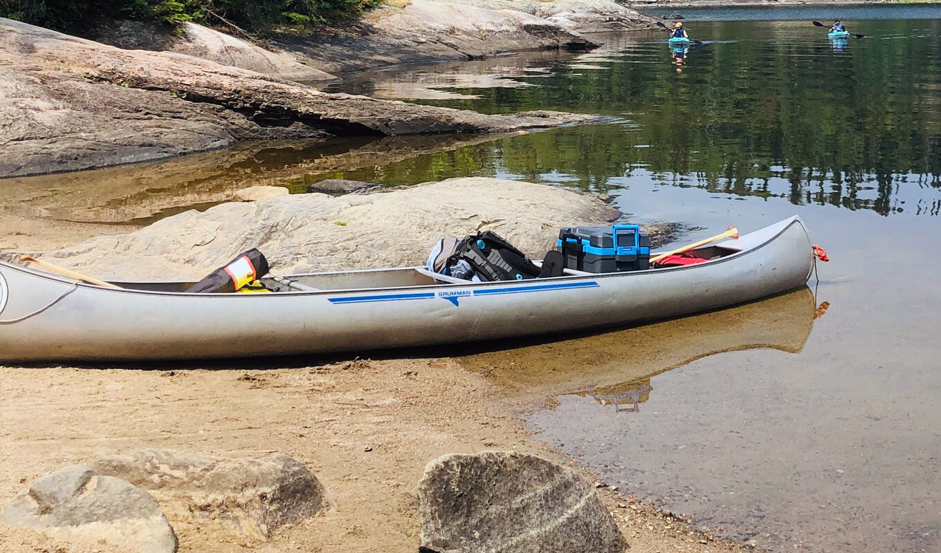 White inflatable kayak with a loads