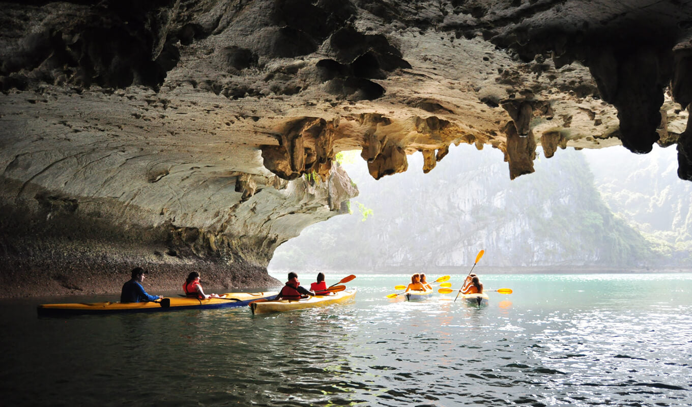 Kayakers and Canoers on a cave