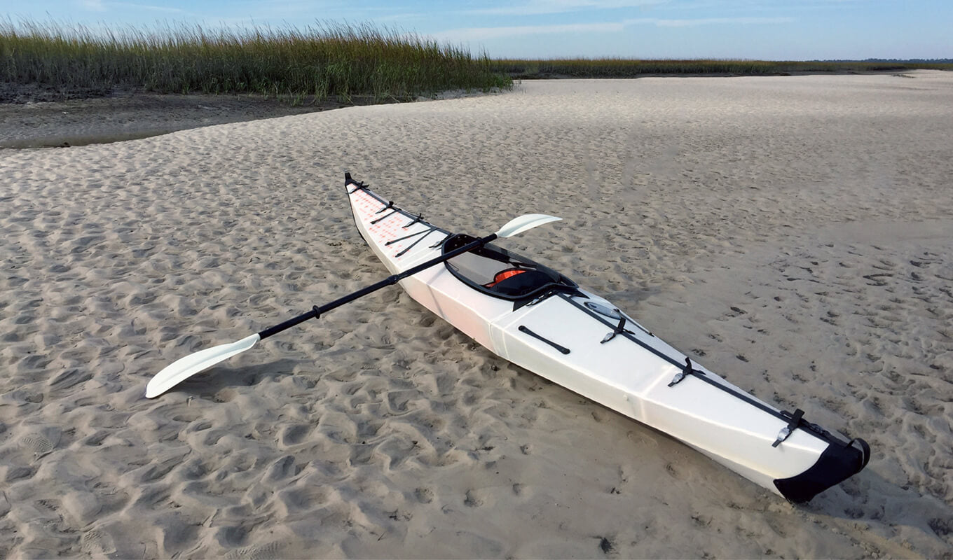 Oru kayak on the sand