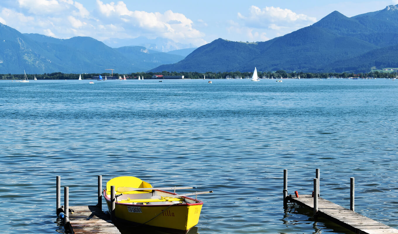 Yellow boat at chiemsee tranquil freshwater