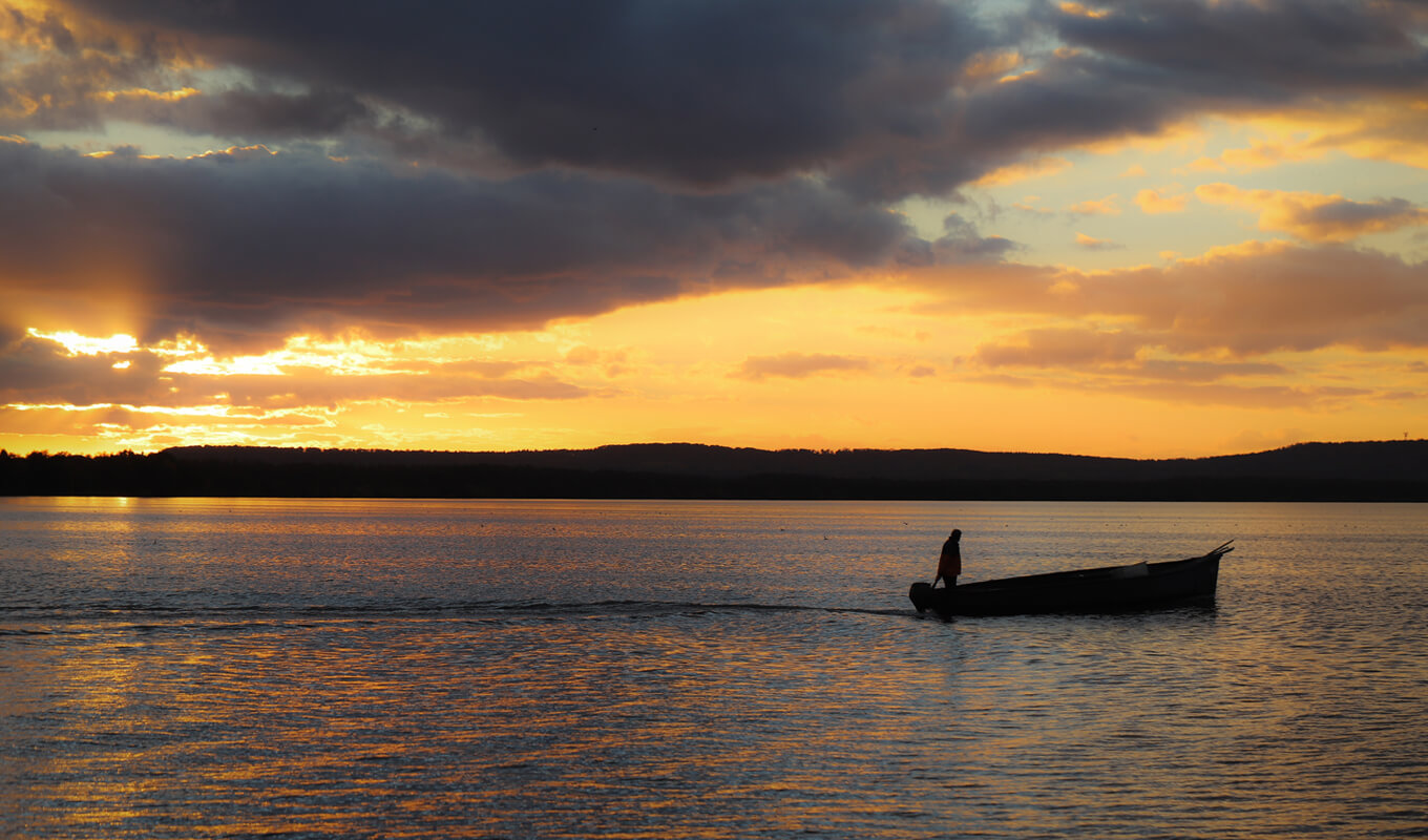 Silhouette of a boat at Steinhuder Meer