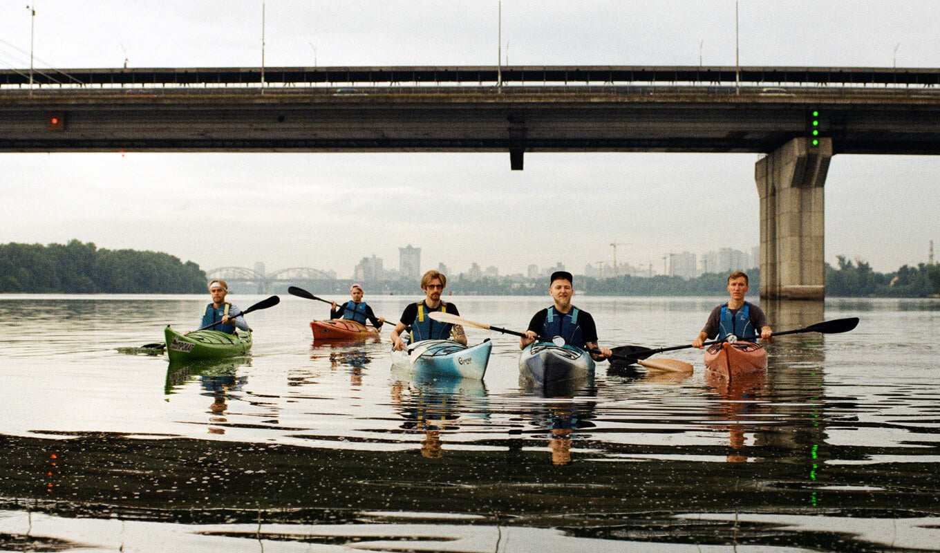 Group of man with a kayak