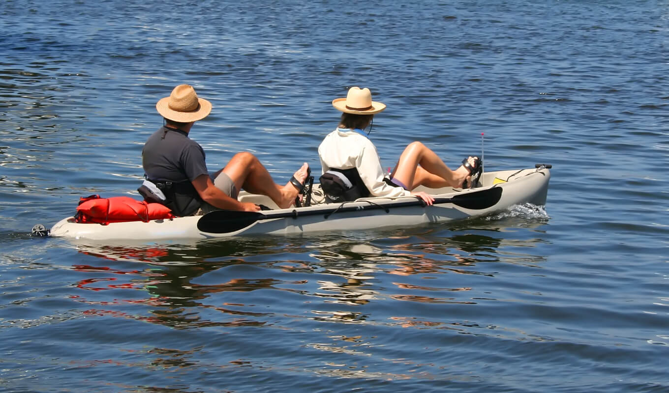 Man and a woman on a pedal kayak