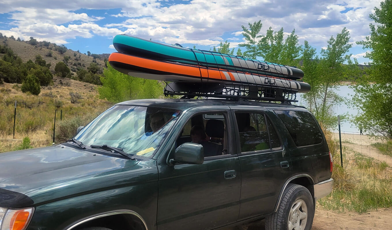 GILI inflatable paddle board on a car roof rack