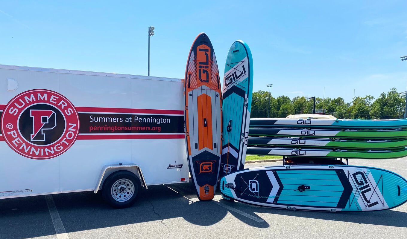 GILI Inflatable paddle boards transported by a truck
