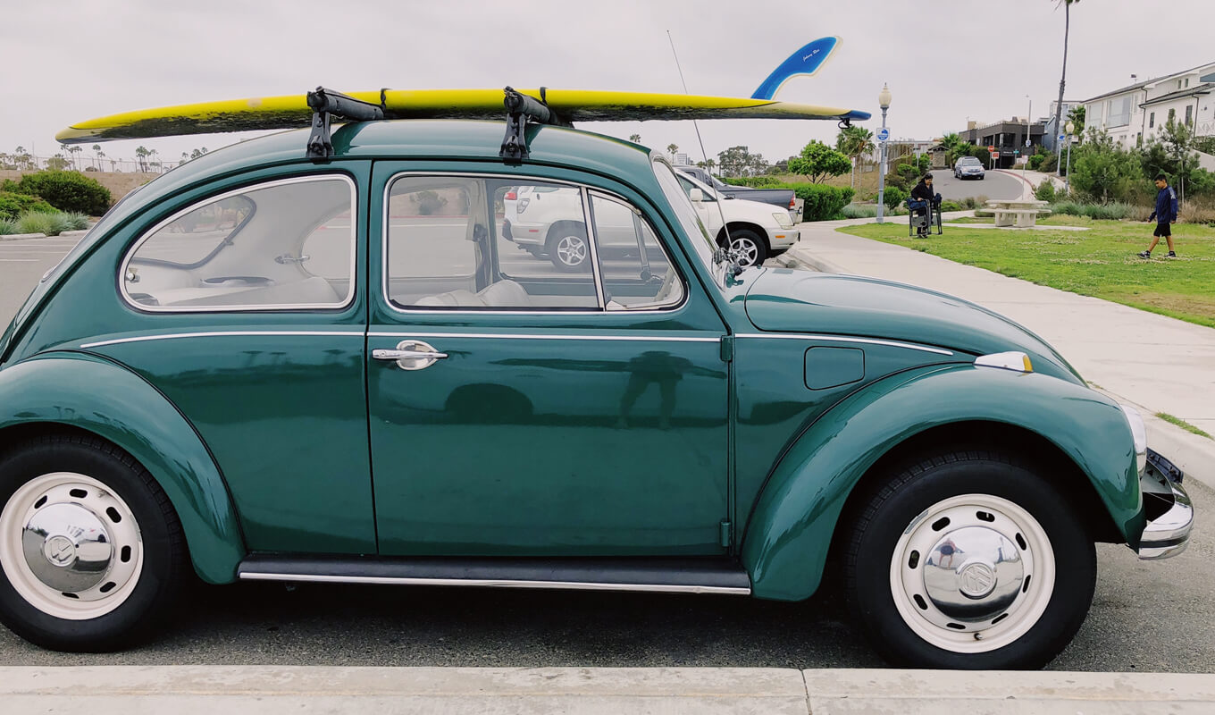 A hatchback car with a roof rack