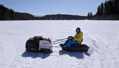 Snowdog in Northwestern Ontario, Canada - sits right on top of deep snow!