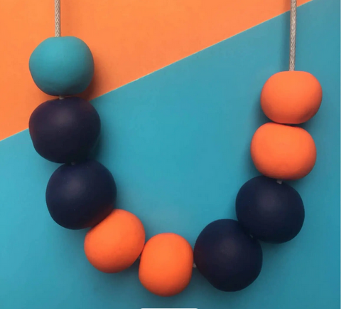 https://www.etsy.com/uk/listing/544776062/orange-navy-turquoise-statement-necklace?ref=shop_home_recs_1&frs=1&sca=1