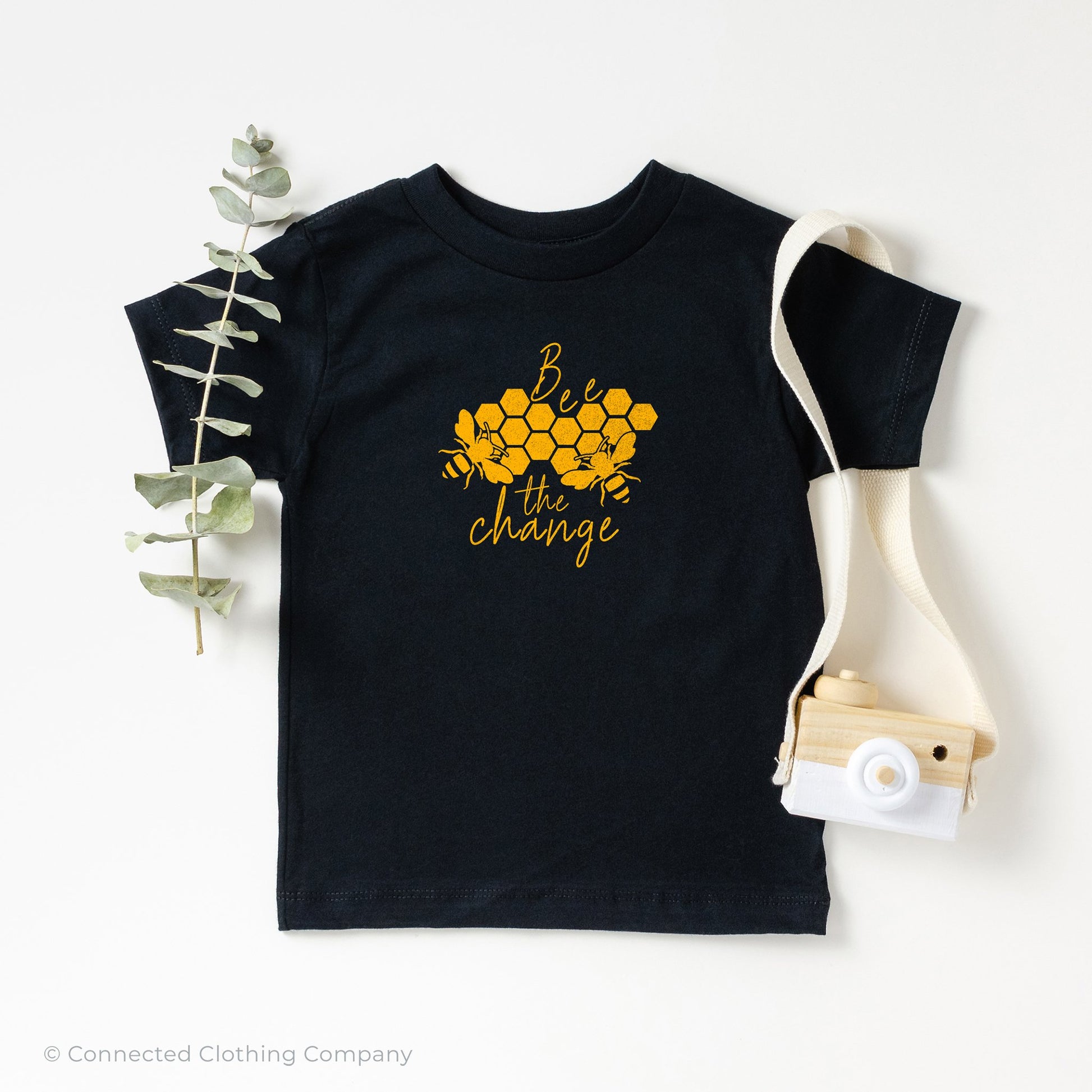 Bee The Change Toddler Short-Sleeve Tee in Black - sweetsherriloudesigns - 10% of profits donated to The Honeybee Conservancy, supporting bee conservation and building bee habitats