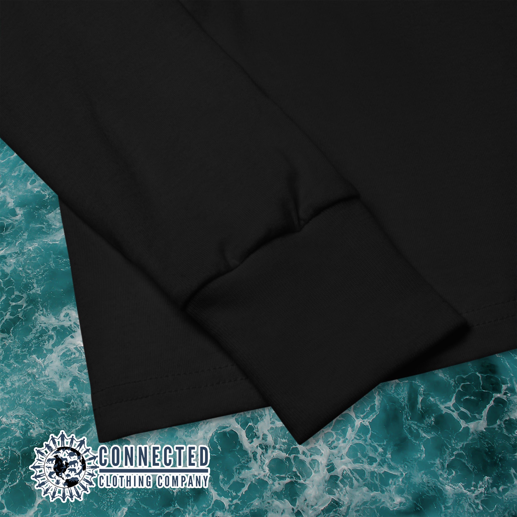 Sleeve Details of Black Protect Our Sharks Youth Long-Sleeve Tee - sweetsherriloudesigns - Ethically and Sustainably Made - 10% donated to Oceana shark conservation