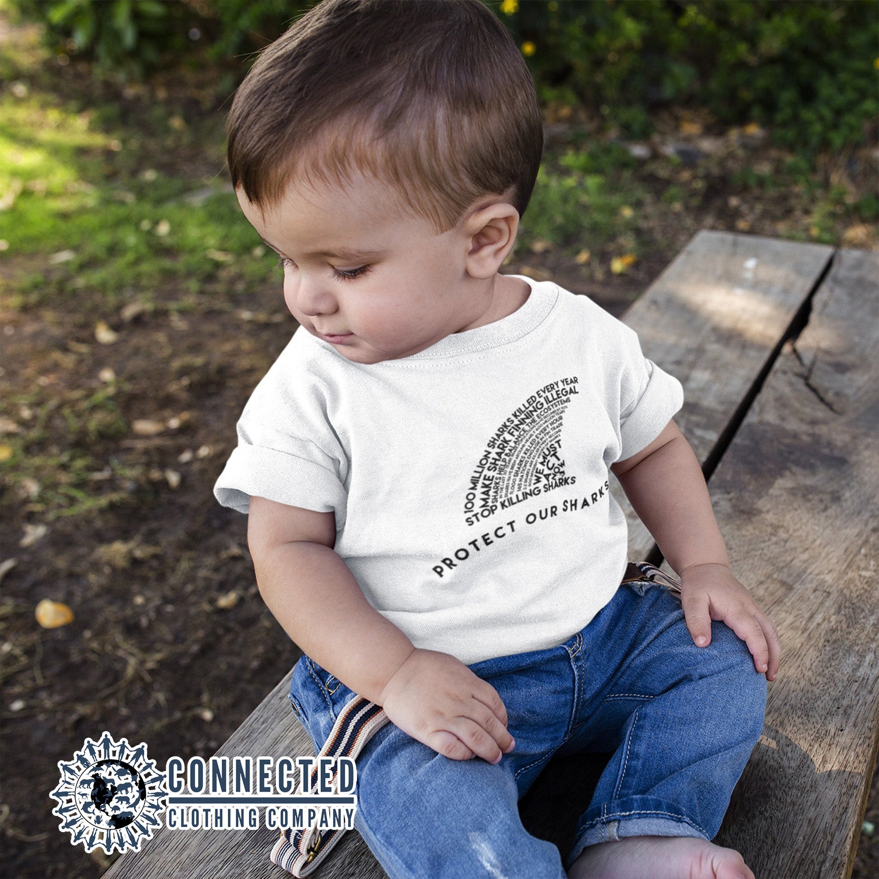 Toddler Model Wearing White Protect Our Sharks Toddler Short-Sleeve Tee - sweetsherriloudesigns - 10% of profits donated to Oceana shark conservation