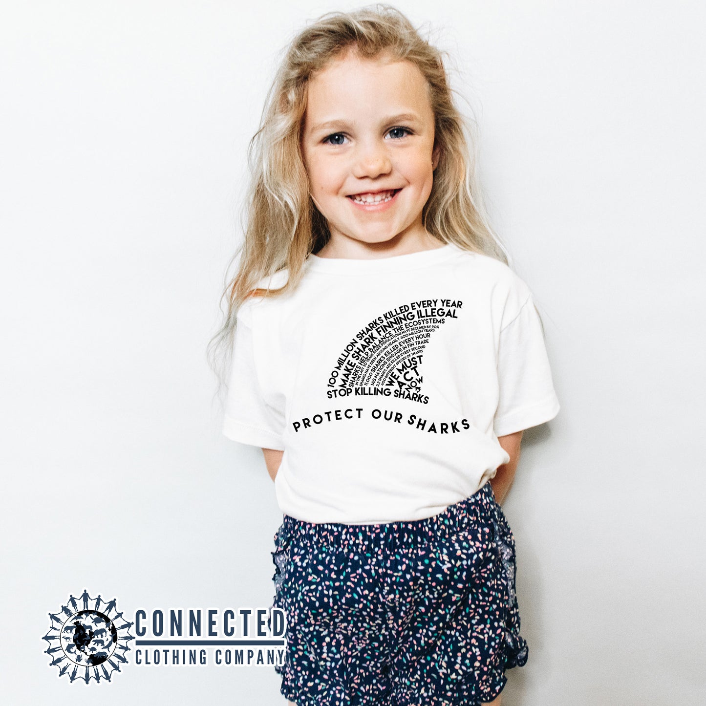 Toddler Model Wearing White Protect Our Sharks Toddler Short-Sleeve Tee - sweetsherriloudesigns - 10% of profits donated to Oceana shark conservation