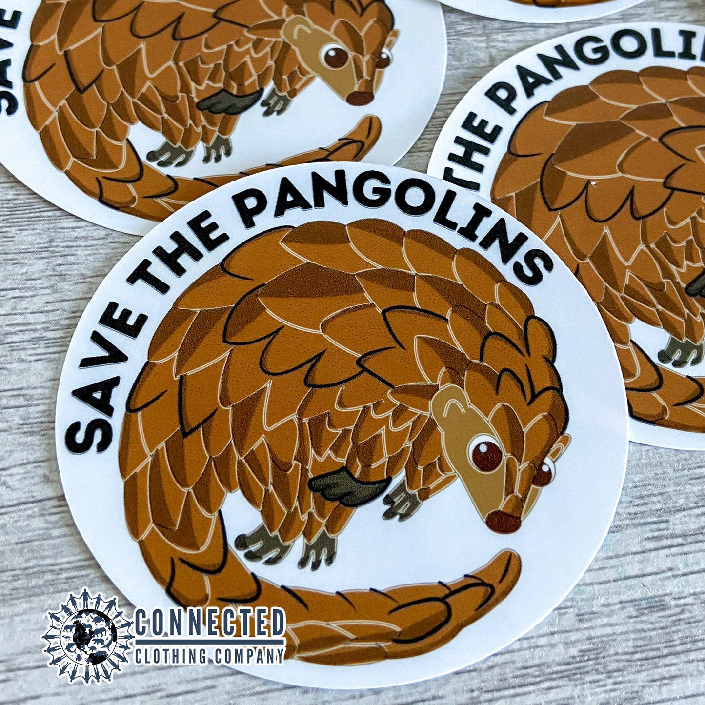 Close up of Save The Pangolins Sticker - sweetsherriloudesigns -  portion of profits donated to save the pangolins