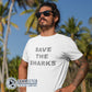White Save The Sharks Short-Sleeve Unisex T-Shirt reads "Save The Sharks." - architectconstructor - Ethically and Sustainably Made - 10% donated to Oceana shark conservation
