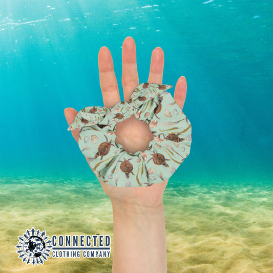 Hand Holding Sea Turtle Scrunchie - sweetsherriloudesigns - Ethical & Sustainable Apparel - 10% donated to save the sea turtles