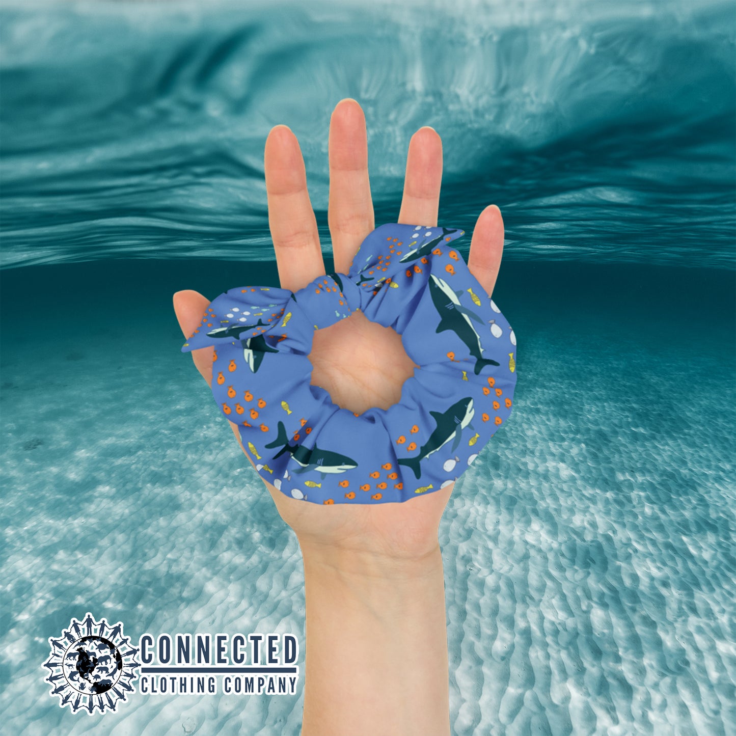 Hand Holding Shark Scrunchie in Dark Color - sweetsherriloudesigns - Ethical & Sustainable Apparel - 10% donated to save the sharks