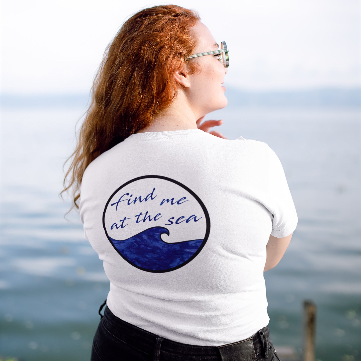 Model Wearing White Find Me At The Sea Short-Sleeve Tee in front of dock on the water - sweetsherriloudesigns - 10% donated to Mission Blue ocean conservation