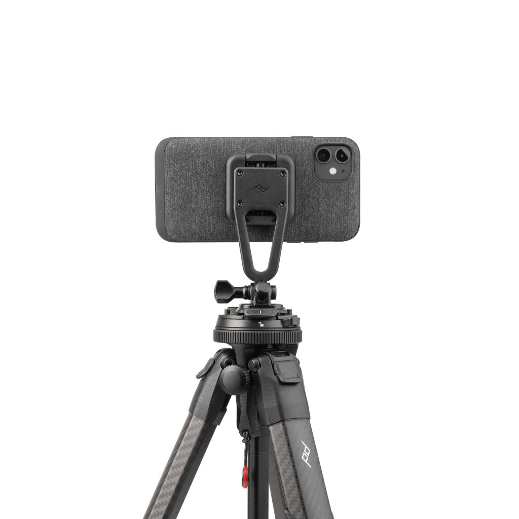 An iPhone with Everyday case attached on a Creator Kit mounted on a Carbon-fiber Travel tripod