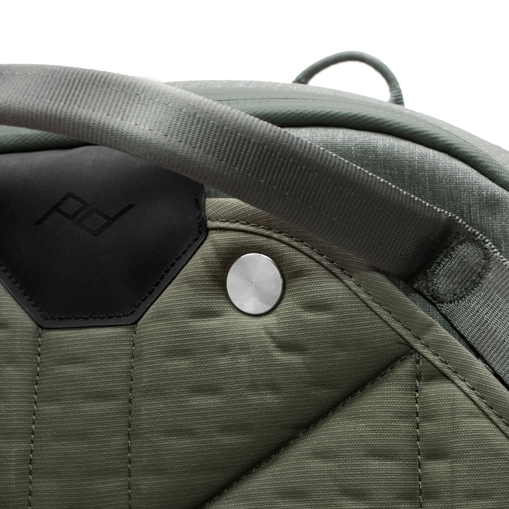 Close up of stitching on sage 45L Travel Backpack