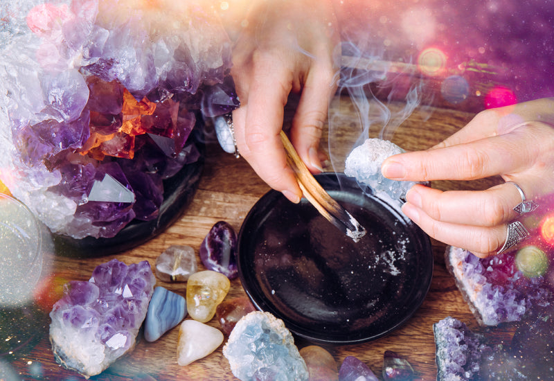 women's hands manipulating crystals and doing rituals with paula santo