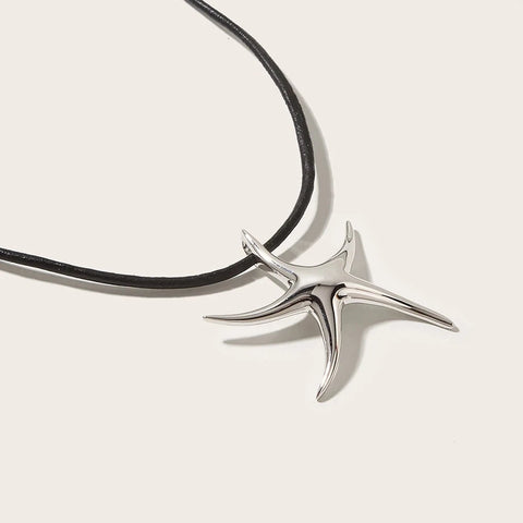 https://the-fashion-paradox.com/products/collier-etoile-de-mer-en-argent-925-sterling-cordon-noir-edition-limitee