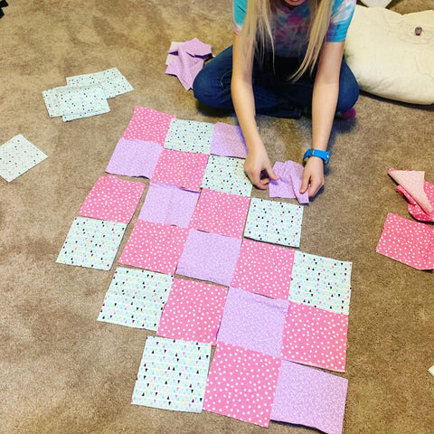 Laying out squares for a doll quilt