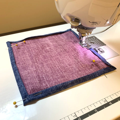 Stitching the binding in place