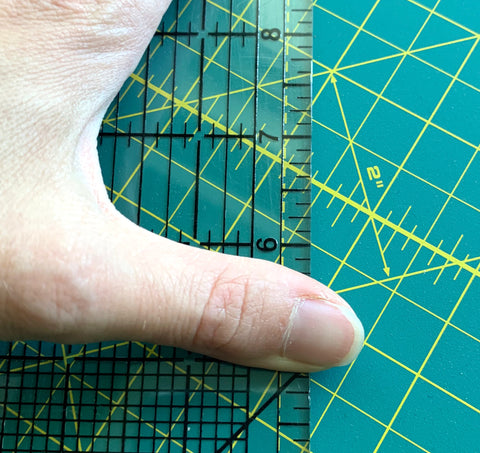 Bad example of holding the ruler