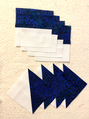 Pieces for the Churn Dash Quilt Block