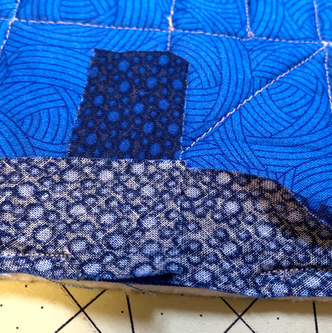 Joining the ends of binding. Cutting to the right length.
