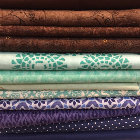 Brown, Teal, and Blue fabric selection