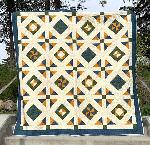 All Seasons Squares Quilt in Blue, Green, and Yellow