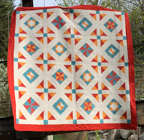 All Seasons Squares Quilt in Red, Teal, and Yellow