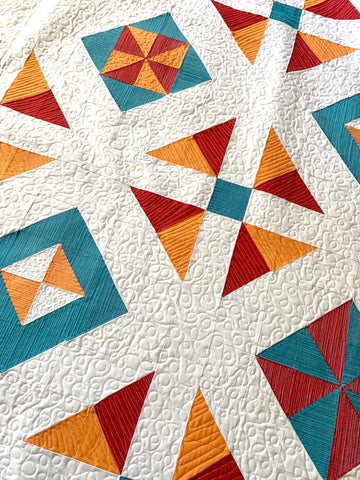 Close up of quilting on the All Seasons Squares Quilt